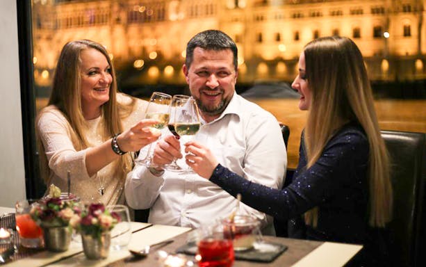Guests toasting on a Budapest New Year’s Eve cruise.