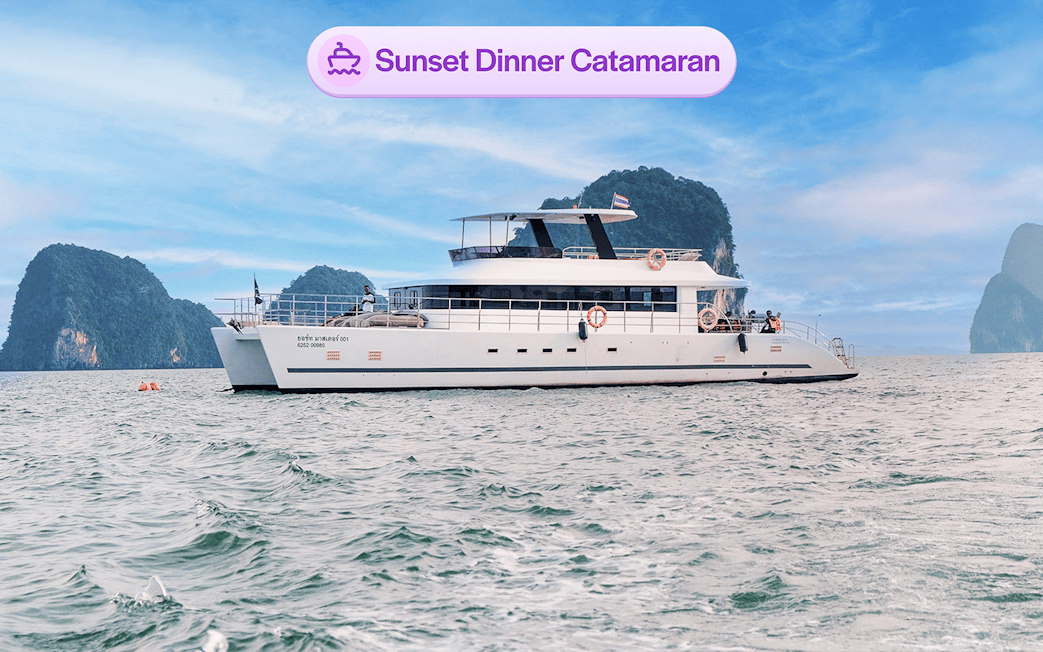 Luxury catamaran cruising near James Bond Island in Thailand.