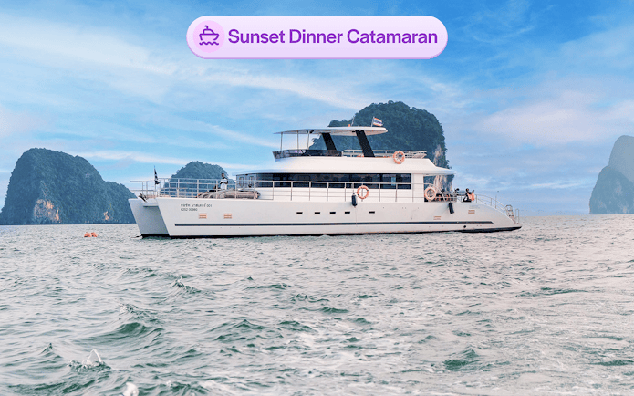 Luxury catamaran cruising near James Bond Island in Thailand.