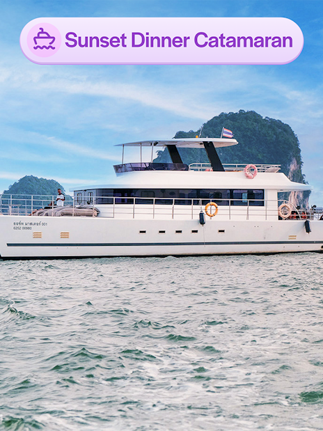 Luxury catamaran cruising near James Bond Island in Thailand.