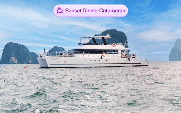 Luxury catamaran cruising near James Bond Island in Thailand.
