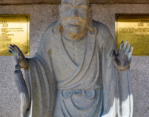 Chin Swee Caves Temple pagoda with lush forest backdrop in Genting Highlands, Malaysia.
