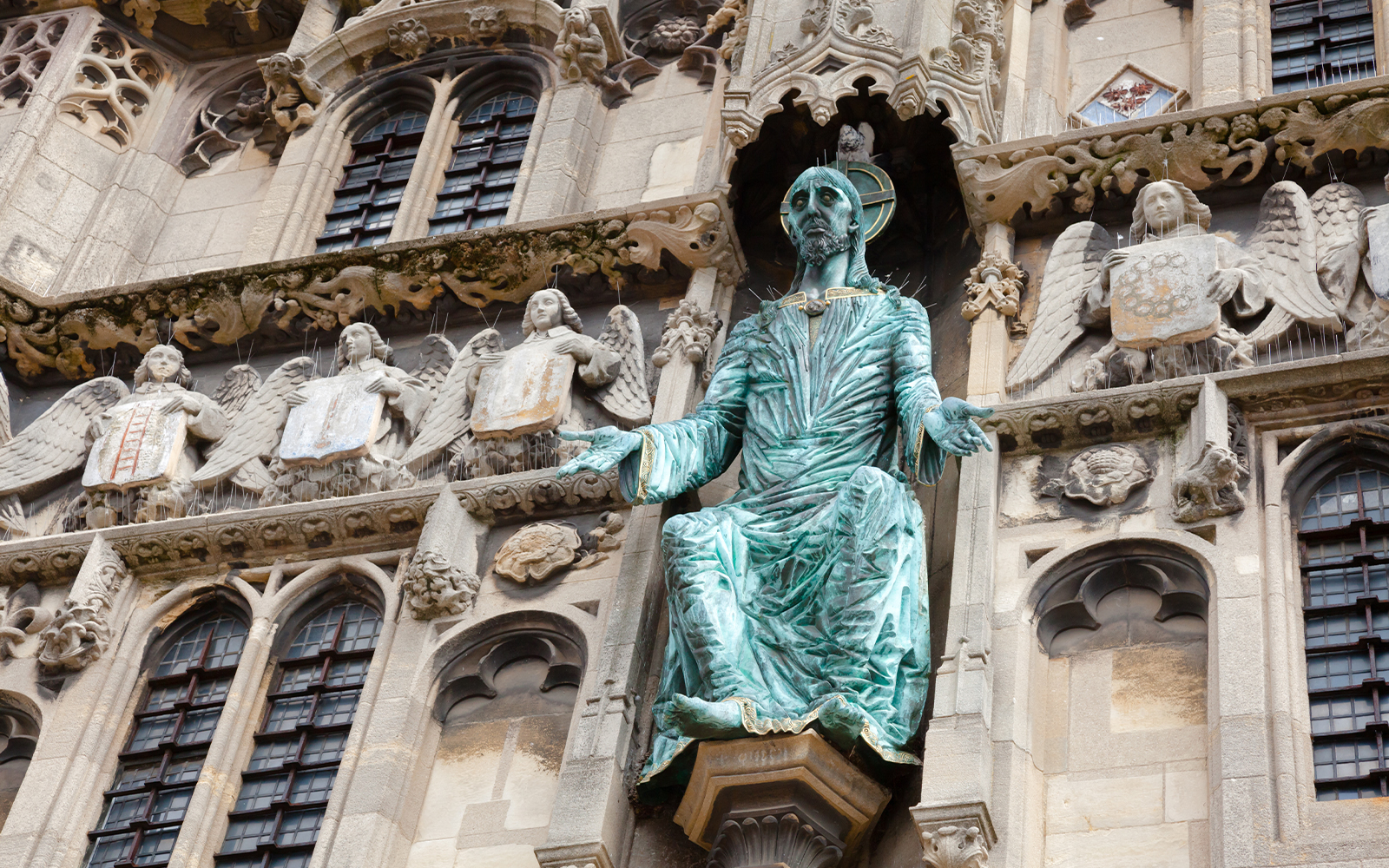Canterbury Cathedral entrance facade with detailed sculptures, Kent, Southern England.