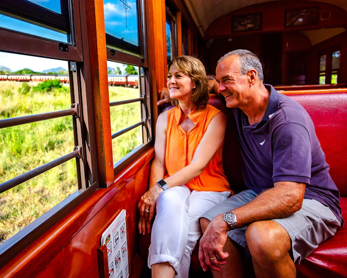 From Cairns: Scenic Train & Coach Guided Tour with Transfers