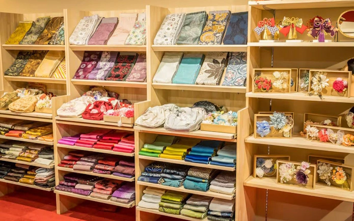 Kimono fabrics and accessories displayed for Tea Ceremony with Kimono Experience in Shinjuku.