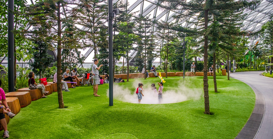 Children playing in Foggy Bowls at Canopy Park, Jewel Changi.