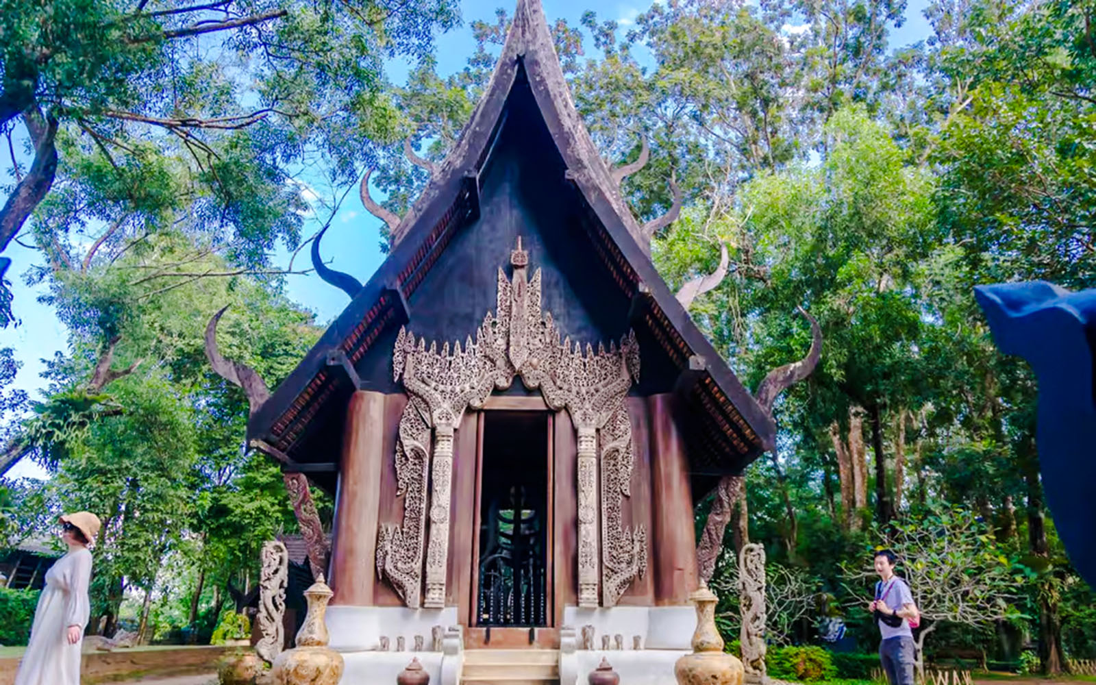 Close-up of ornate Black House (Baan Dam) entrance in Chiang Rai, Thailand.