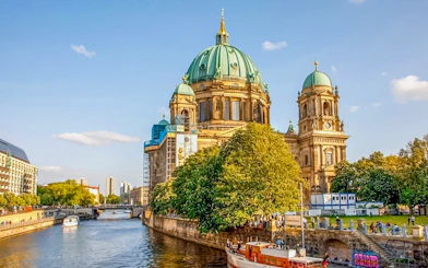 Berlin Cathedral viewed from a river during a sightseeing cruise.