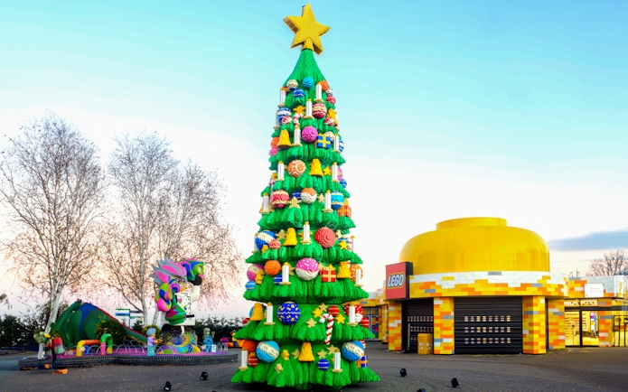 Lego Christmas tree at Legoland London with colorful decorations and a star on top.