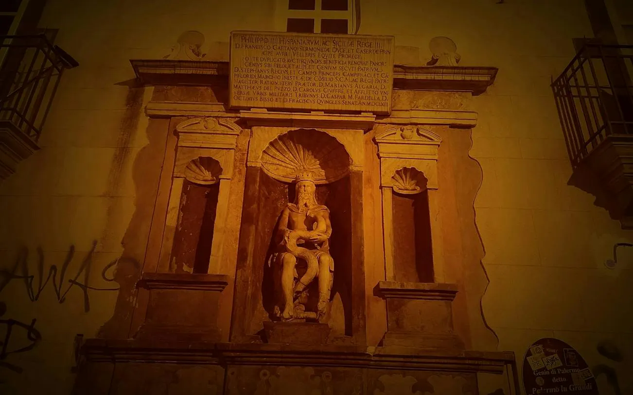 Statue of Genio di Palermo at night, part of Haunted Palermo Vengeful Ghosts tour.