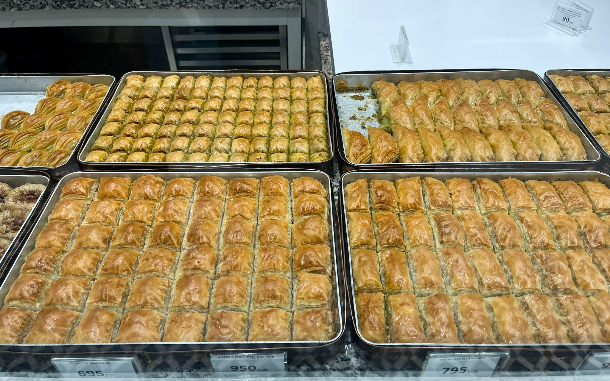Trays of assorted baklava on display for Turkish Food Night in Istanbul.