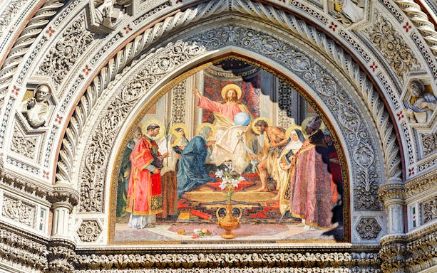 Mosaic detail on Florence Cathedral facade during express guided tour.