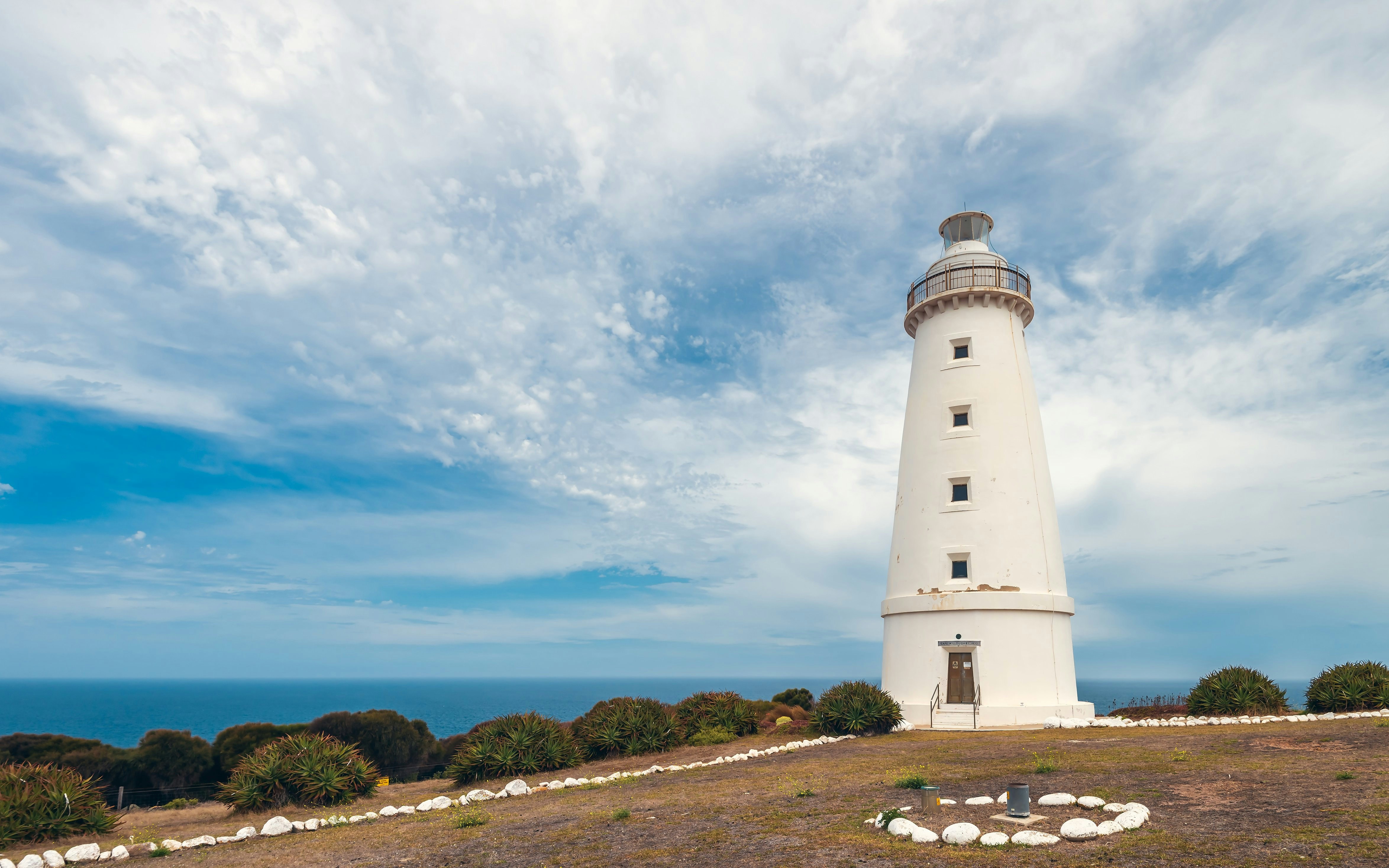 Cape Willoughby Lighthouse on Kangaroo Island with ocean backdrop.