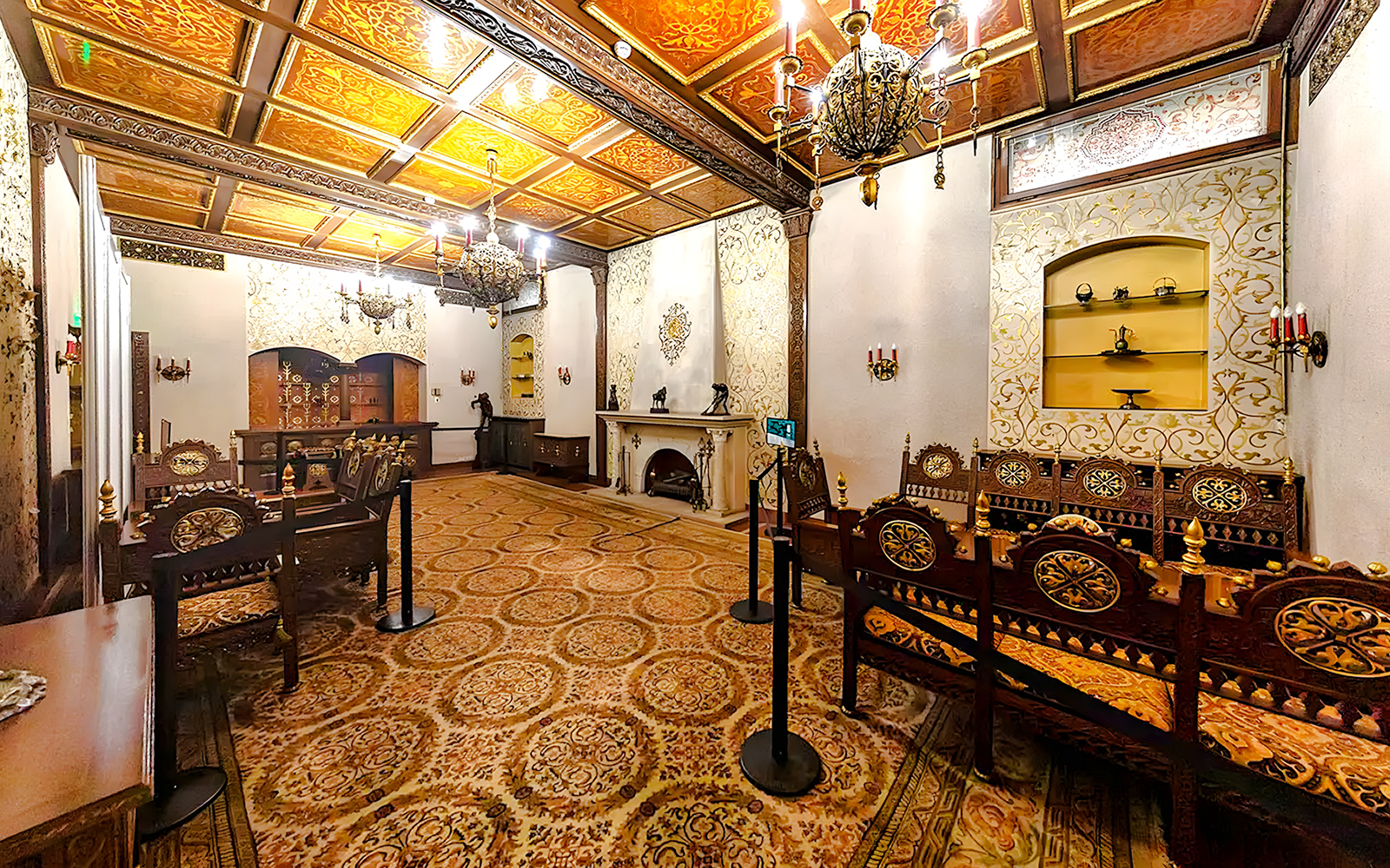 Ceaușescu Mansion interior with ornate wooden furniture and decorative ceiling, Bucharest.