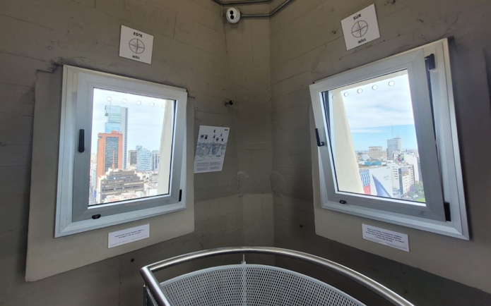 Top floor viewing windows at Obelisco de Buenos Aires overlooking cityscape.