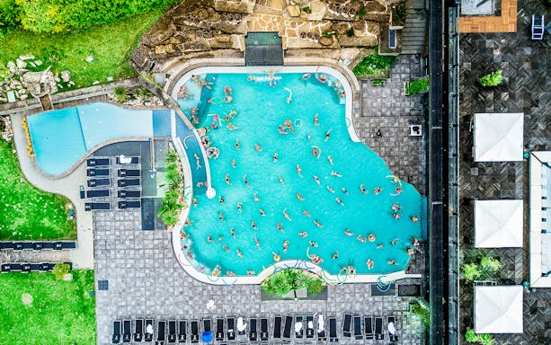 Ròseo Euroterme Thermal Pools, Rimini, Italy, with guests enjoying the warm waters and evening dining experience.