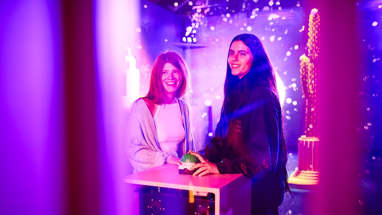 Visitors interacting with an exhibit at Bubble Planet, Washington DC.