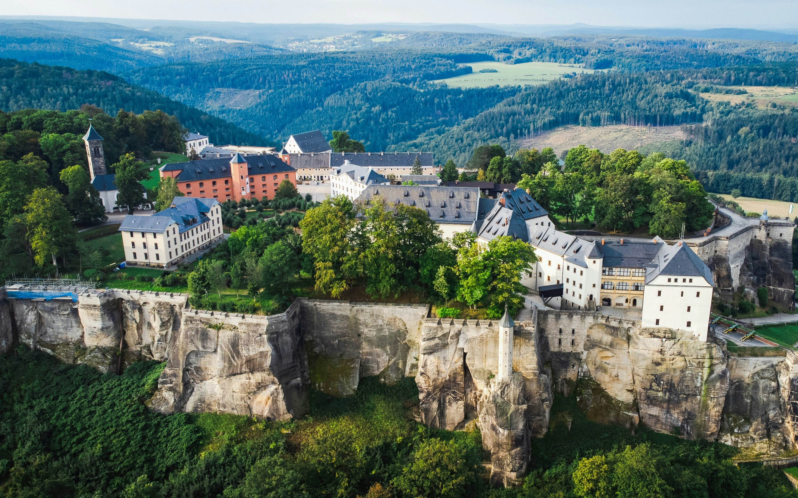 Königstein Fortress atop rocky cliffs in Saxon Switzerland National Park, Germany.
