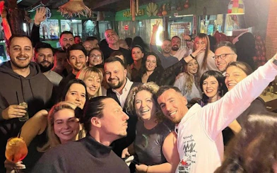 Tirana Pub Crawl: Guided Nightlife Tour with Entry to Three Venues, Welcome Drinks, and DJ Entertainment