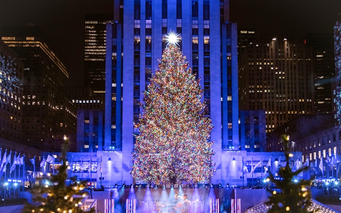 Rockefeller Center Christmas tree lit up at night, New York City.