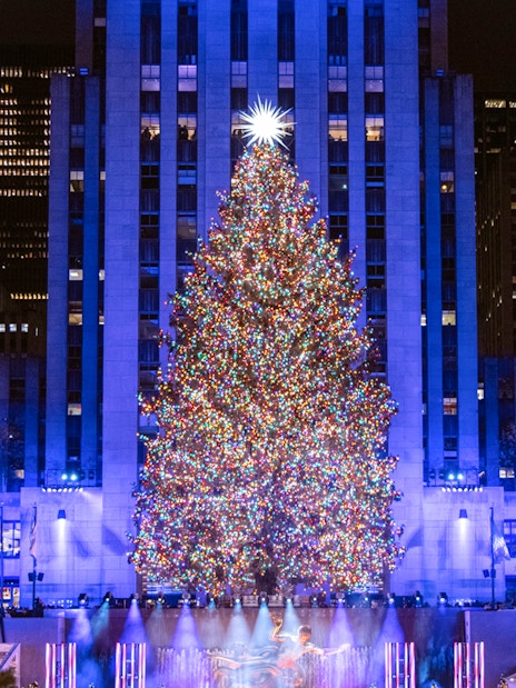 Rockefeller Center Christmas tree lit up at night, New York City.