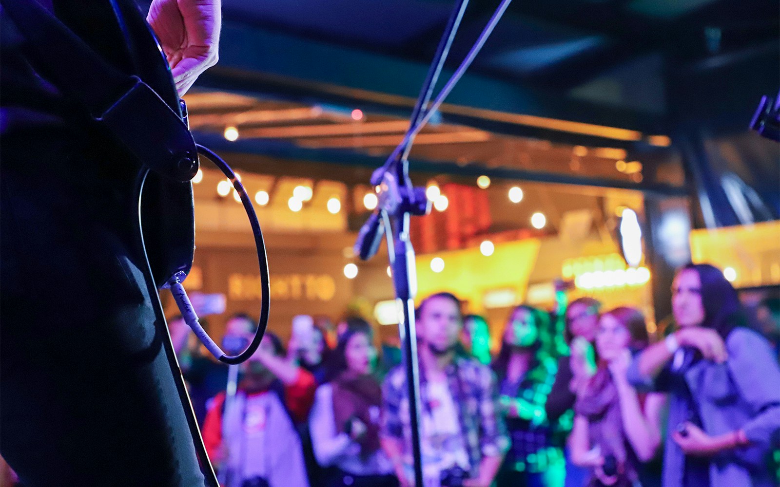 Live music performance in a vibrant Rome night setting.