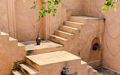 Stone steps and rustic vase at a Da Nang cafe, part of the Coastal Charm Half-Day Tour.