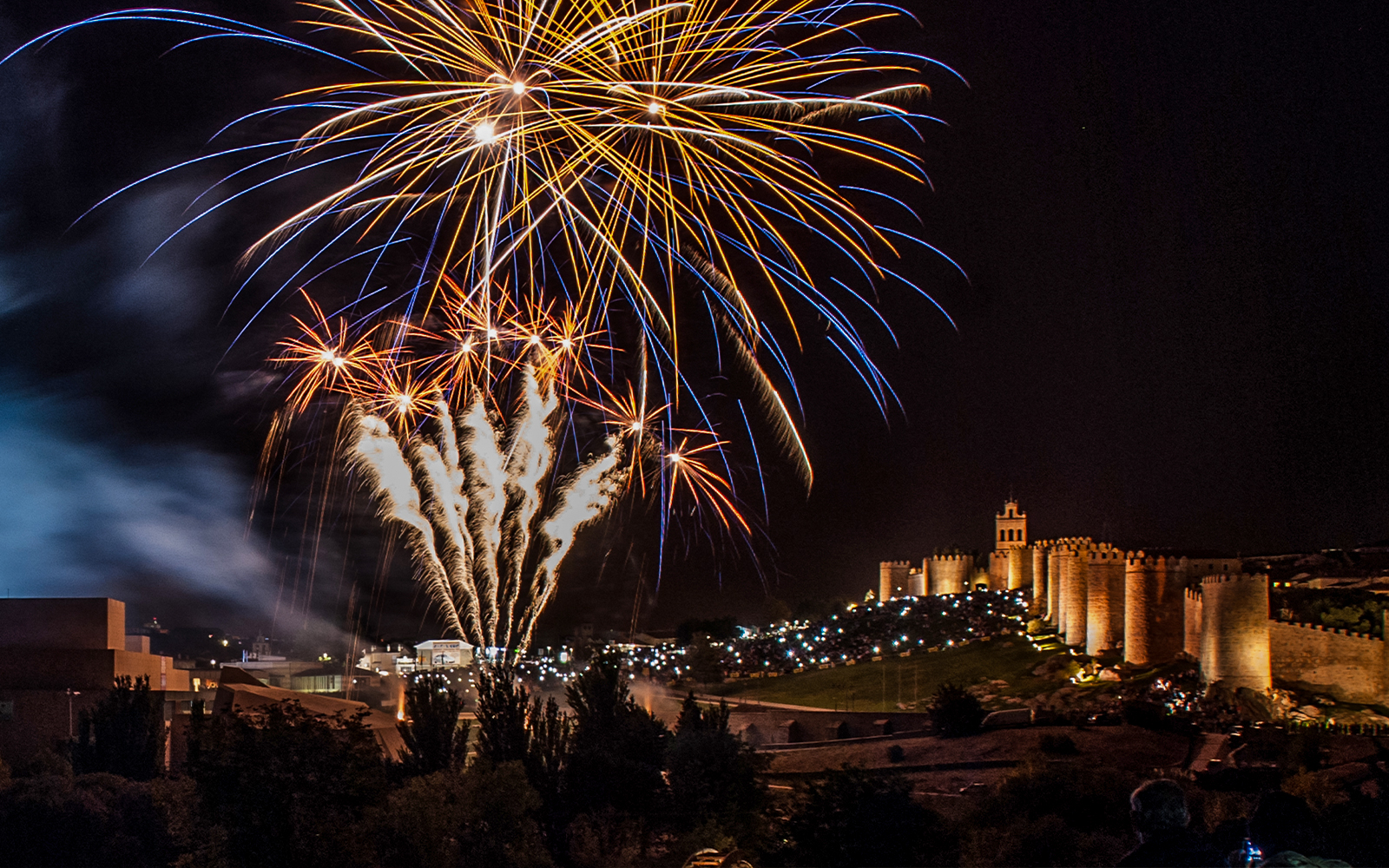 Fireworks over Ávila City Wall during Fiestas de Santa Teresa.
