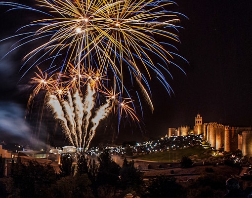 Fireworks over Ávila City Wall during Fiestas de Santa Teresa.