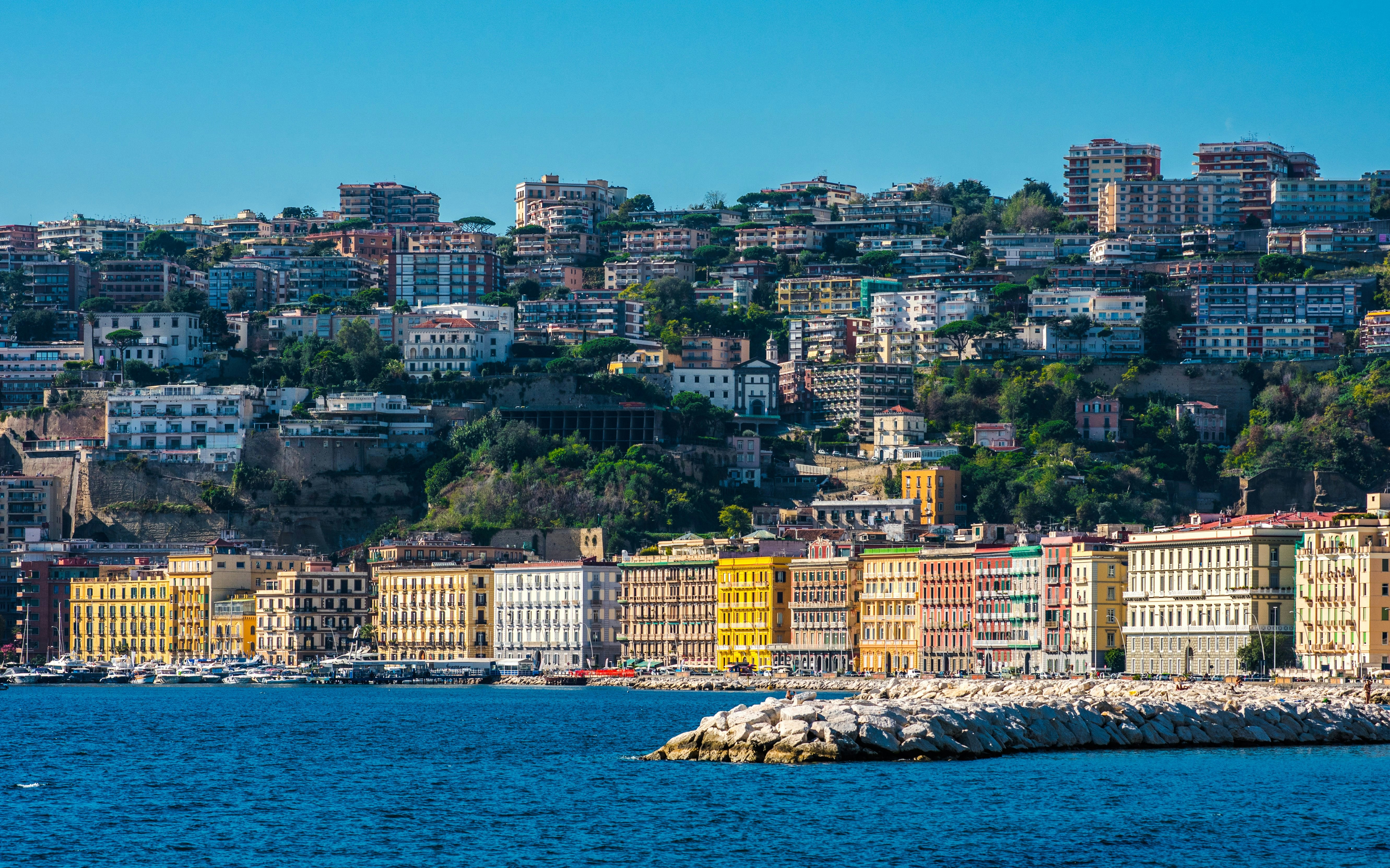 Waterfront view of Mergellina district and Via Francesco Caracciolo in Naples, Italy, with the Tyrrhenian Sea.