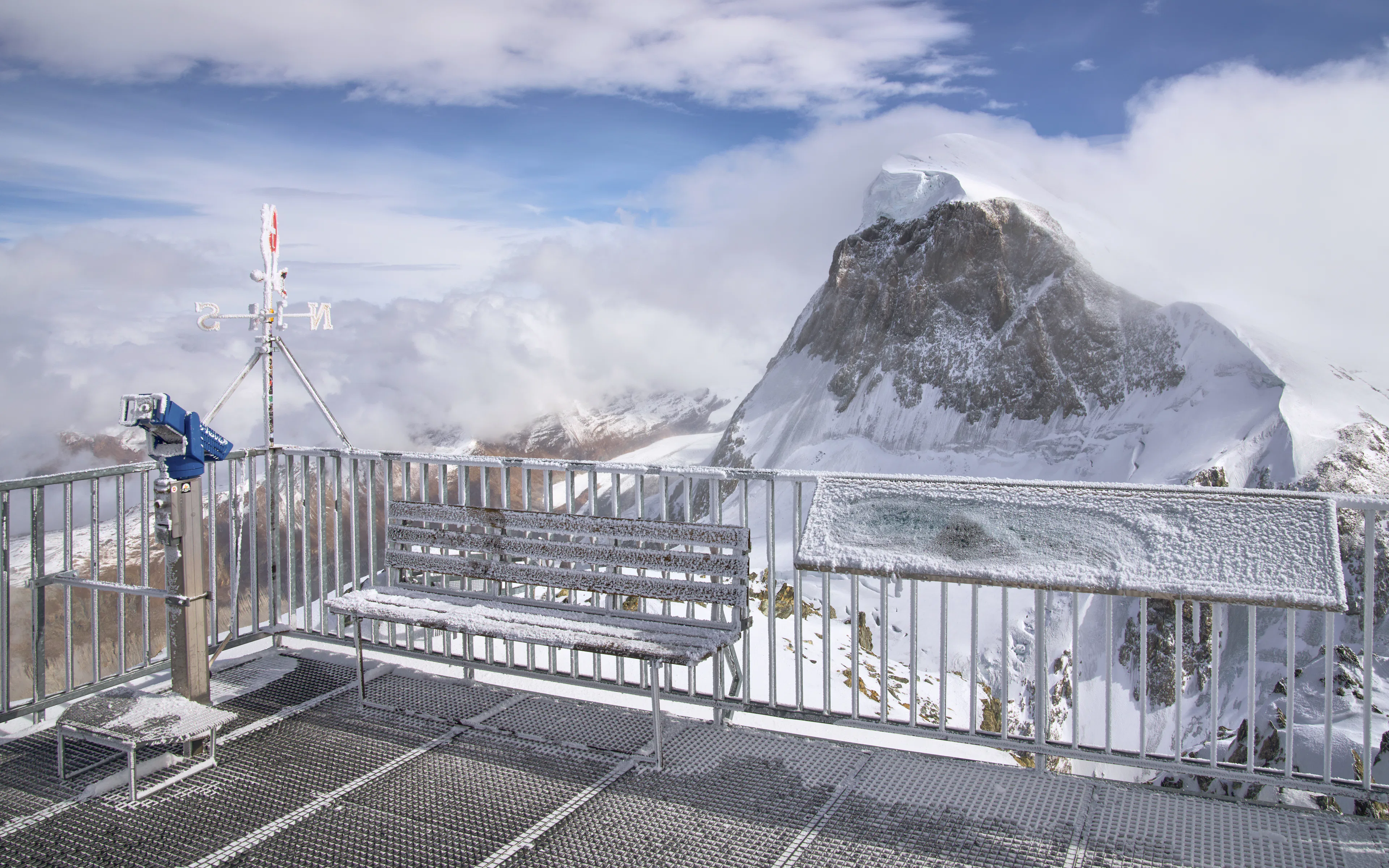 Matterhorn Glacier Paradise viewing platform with snowy mountain backdrop.