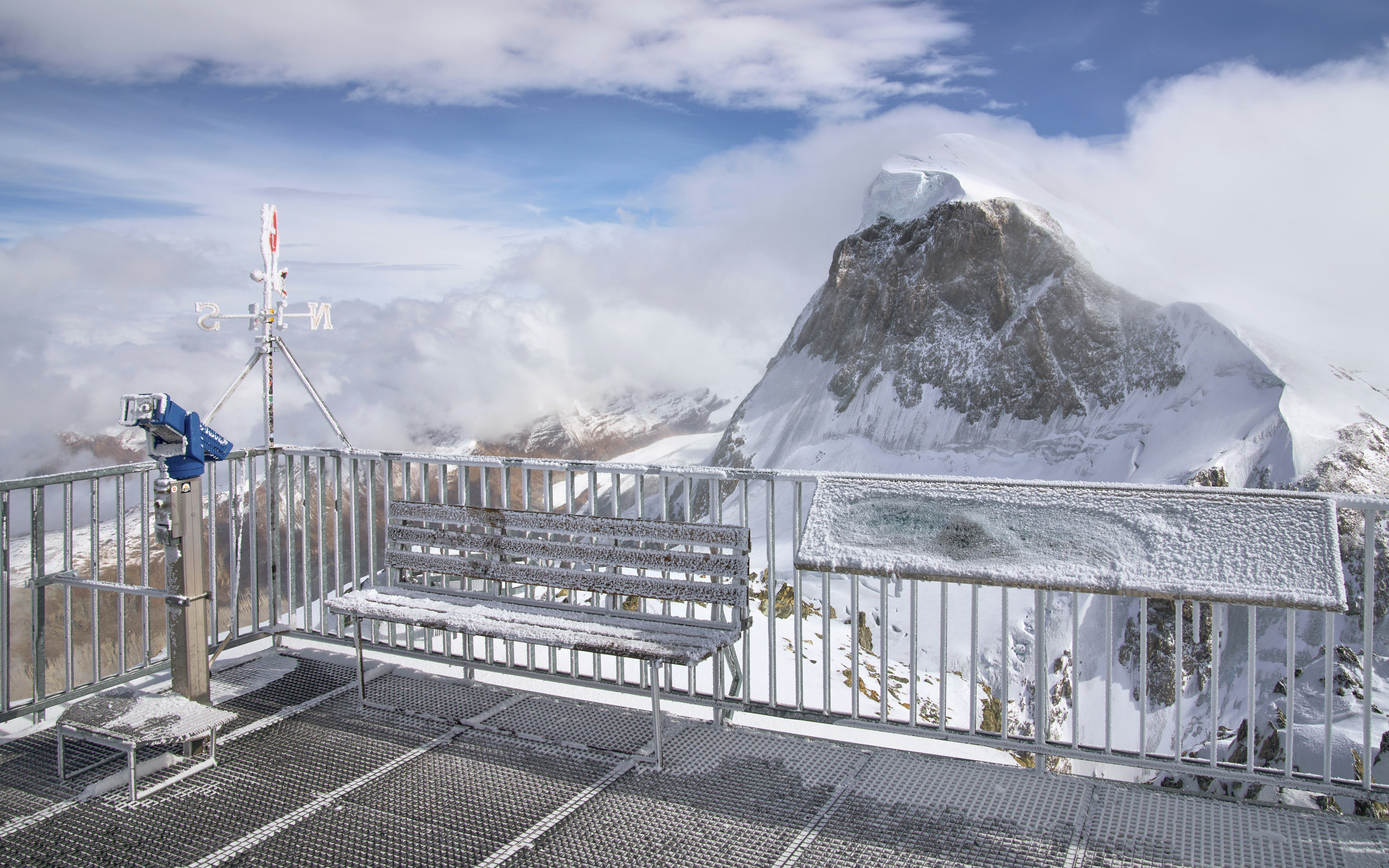 Matterhorn Glacier Paradise viewing platform with snowy mountain backdrop.