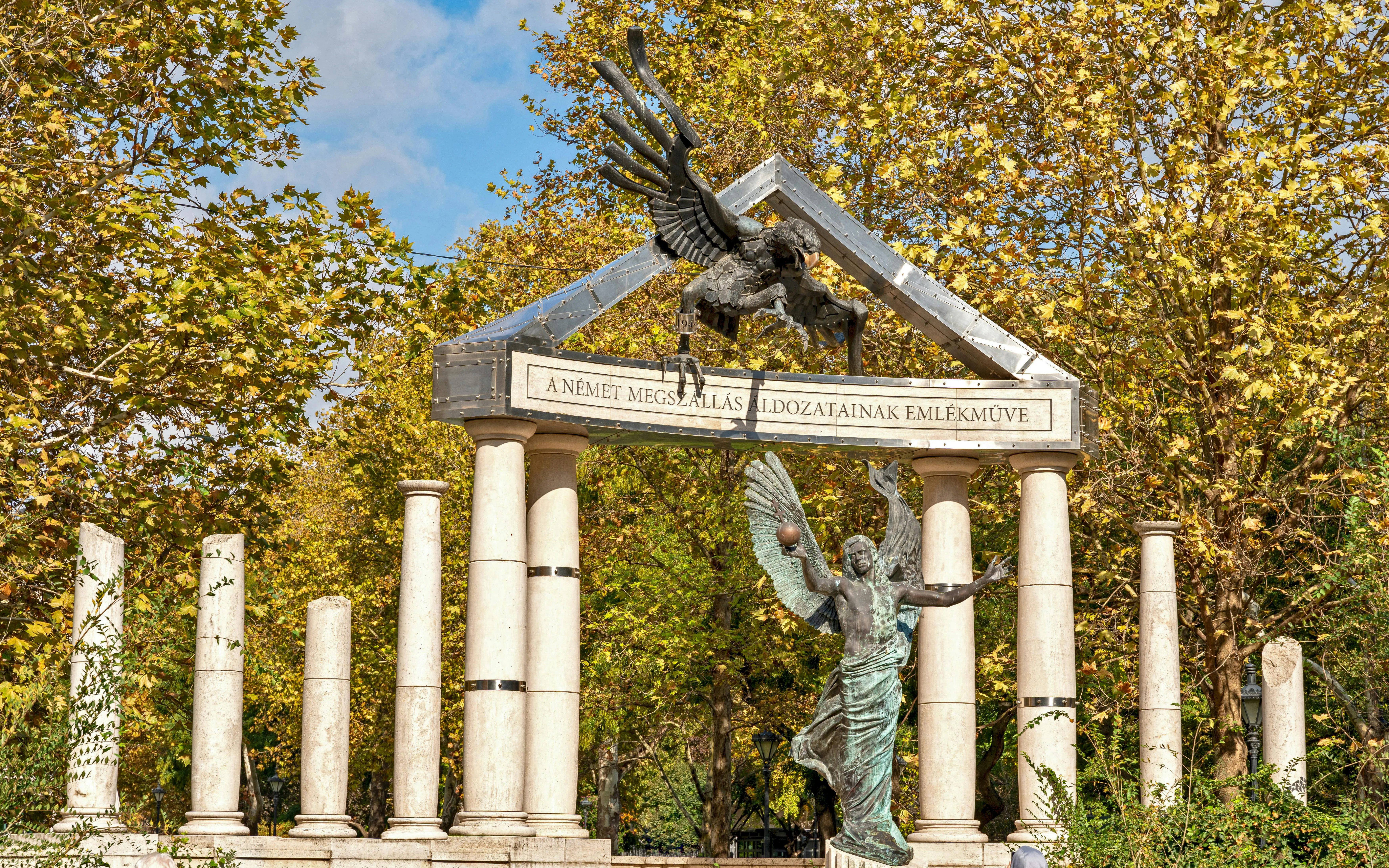Memorial for Victims of German Occupation in Budapest, featuring symbolic sculpture and columns.