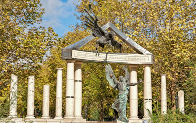 Memorial for Victims of German Occupation in Budapest, featuring symbolic sculpture and columns.