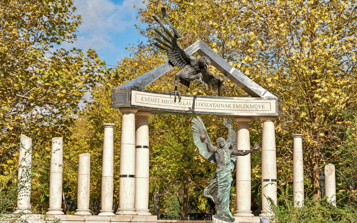 Memorial for Victims of German Occupation in Budapest, featuring symbolic sculpture and columns.
