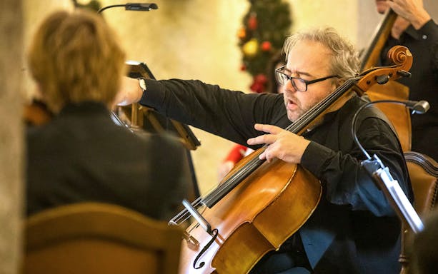 Cellist performing at Fortress Hohensalzburg Christmas Advent Concert.