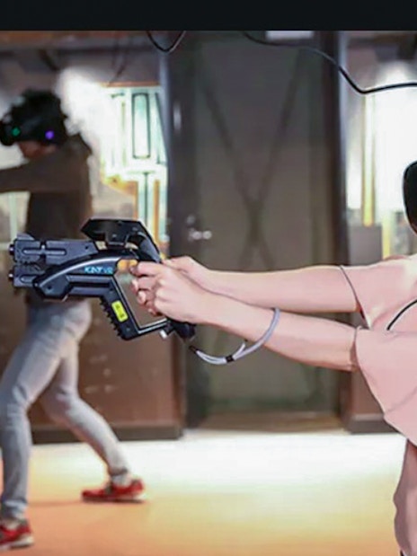 Visitors experiencing virtual reality games at Tokyo JOYPOLIS Theme Park.