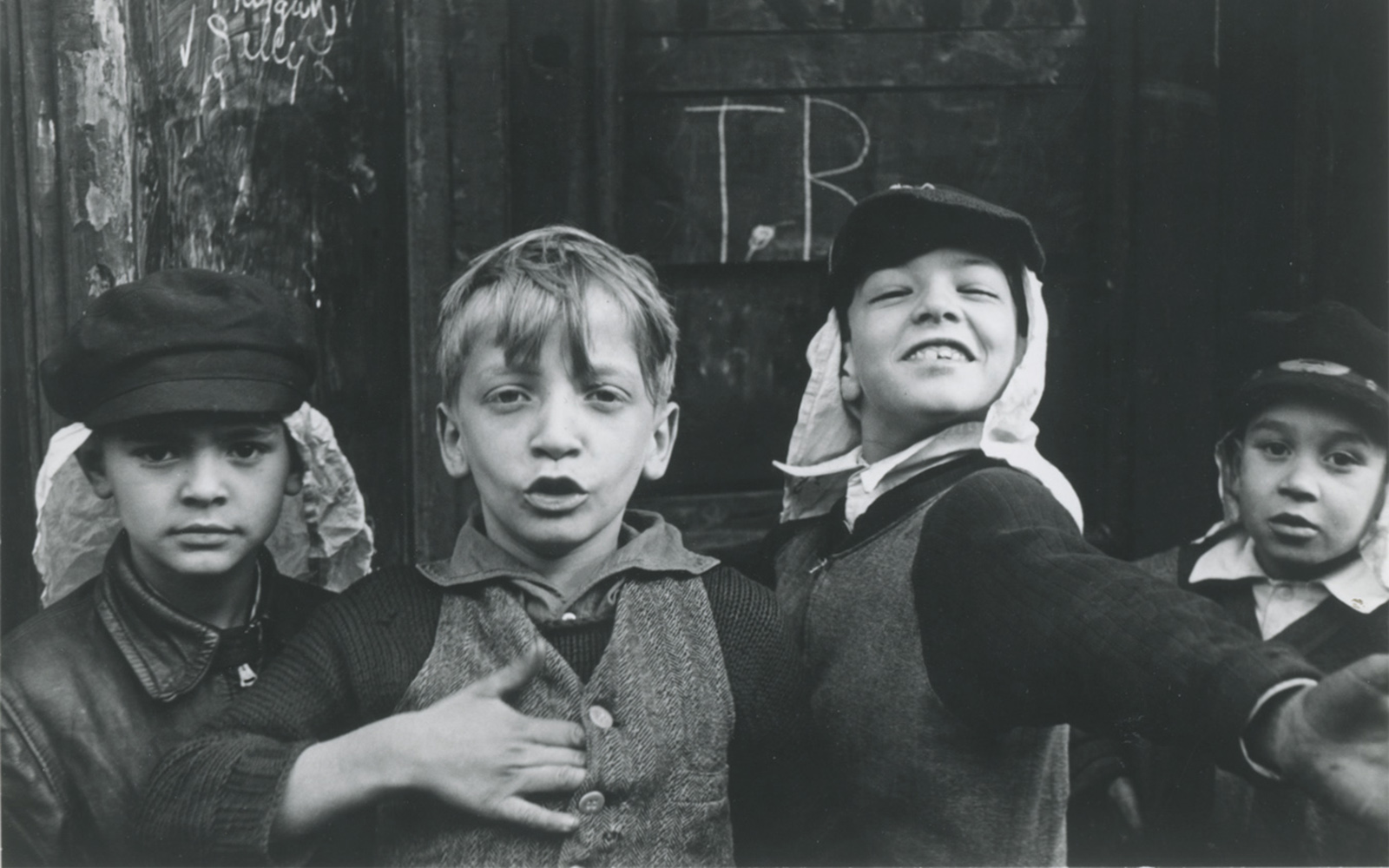 Four boys in "Beau Geste" headgear, New York City, by Helen Levitt, at KBr Fundación MAPFRE Barcelona.