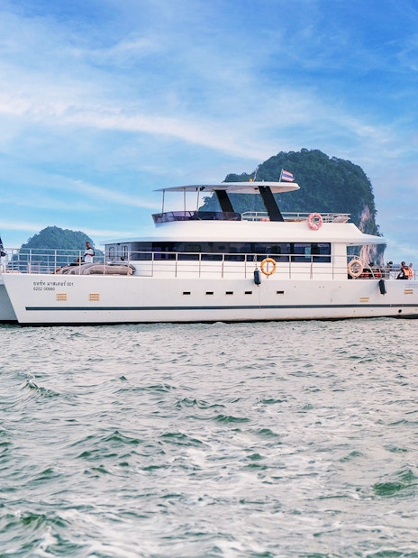 Luxury catamaran cruising near James Bond Island, Thailand.