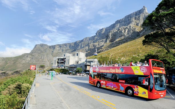 Hop-On Hop-Off bus near Table Mountain, Cape Town.
