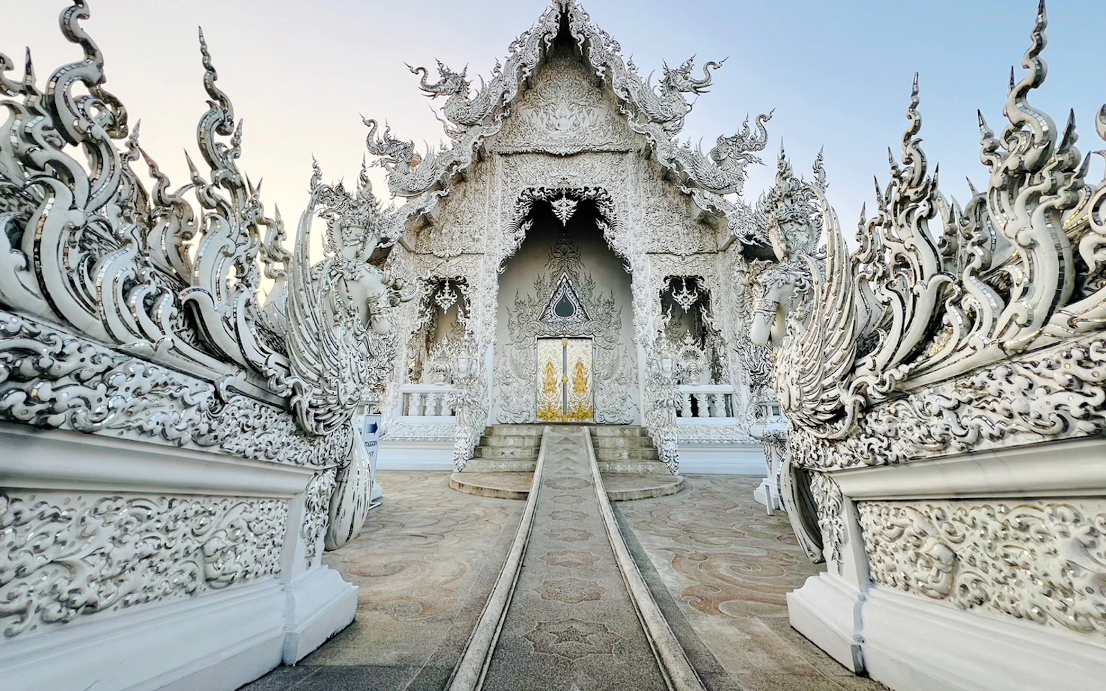 Chiang Rai: White Temple, Blue Temple, Black House & Golden Triangle Guided Tour with Hotel Transfers Image 10