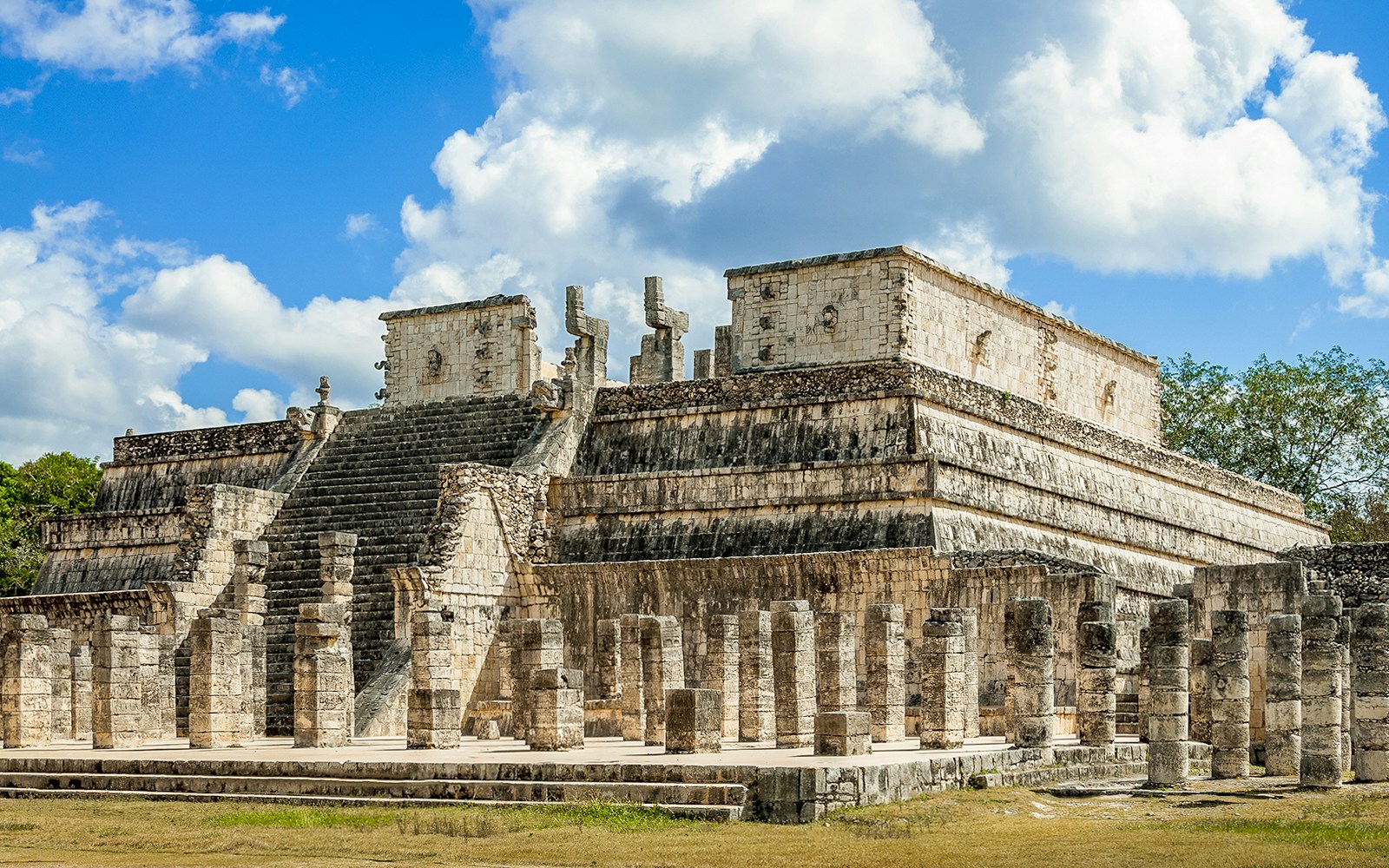 Temple of the Warriors with stone columns and steps in Chichen Itza, Mexico.