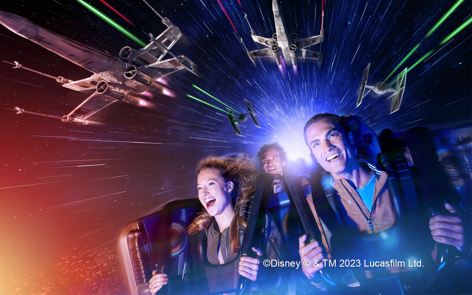 Riders on Star Wars Hyperspace Mountain at Disneyland Paris with X-wing and TIE fighters.
