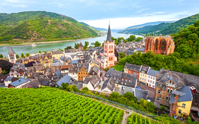 Bacharach old town with Stahleck Castle and Rhine River in the background.