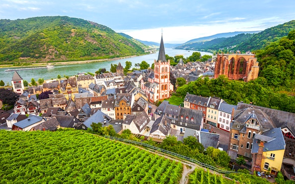 Bacharach old town with Stahleck Castle and Rhine River in the background.