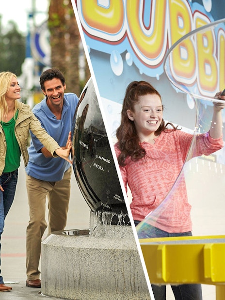 Visitors enjoying interactive exhibits at a science center and bubble lab.