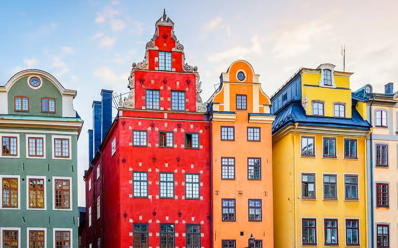 Colorful historic buildings in Gamla Stan, Stockholm near the Royal Palace.