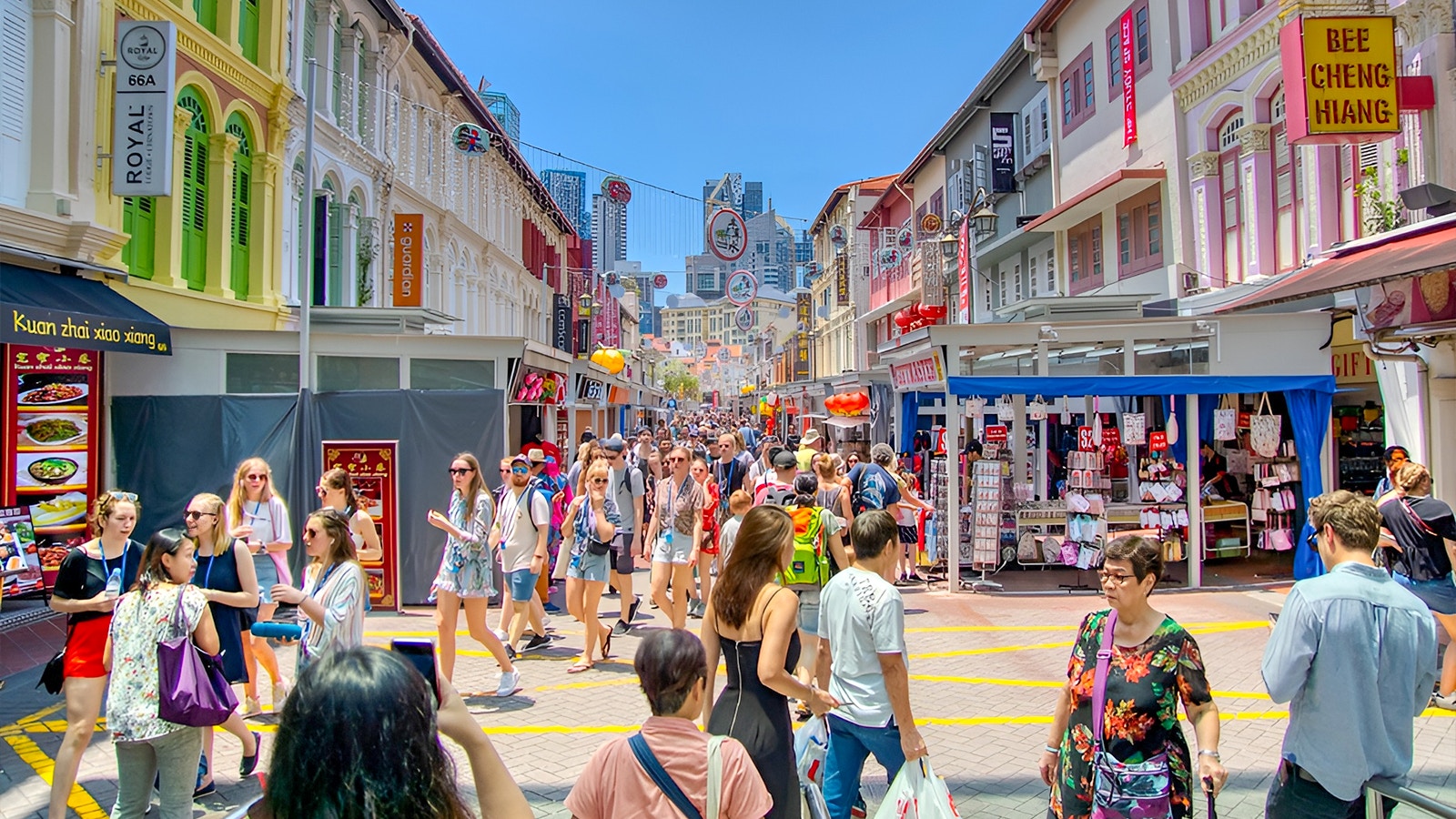 Chinatown street with colorful lanterns, Little India temple, Kampong Gelam City mosque in Singapore.