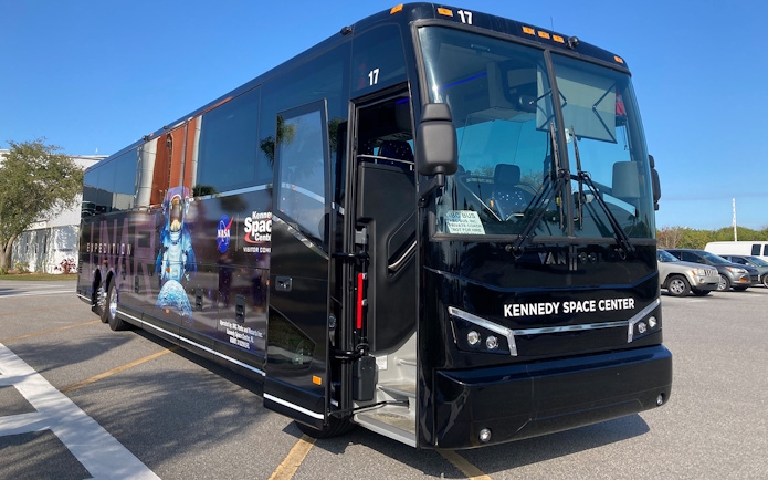 Kennedy Space Center tour bus parked in Florida lot.