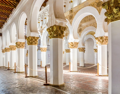 Synagogue of Santa Maria la Blanca, white pillars with golden floral capitals, Toledo.